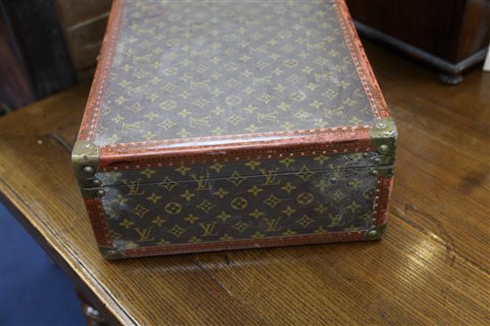 A Louis Vuitton travel case, 19.75 x 14.5 x 7in.